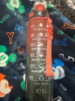 New plastic wrapped 32 oz water bottle