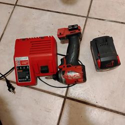 Milwaukee Impact With Charger And Battery 18 Volts