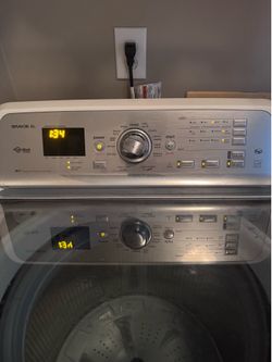 Maytag Bravos XL High-Efficiency (HE) top-load washing machine with an impeller/wash plate