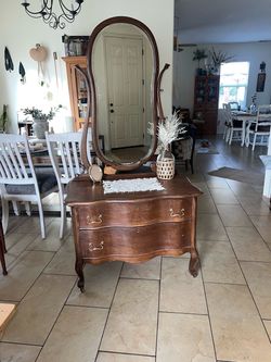 Antique chest of drawers with swivel mirror