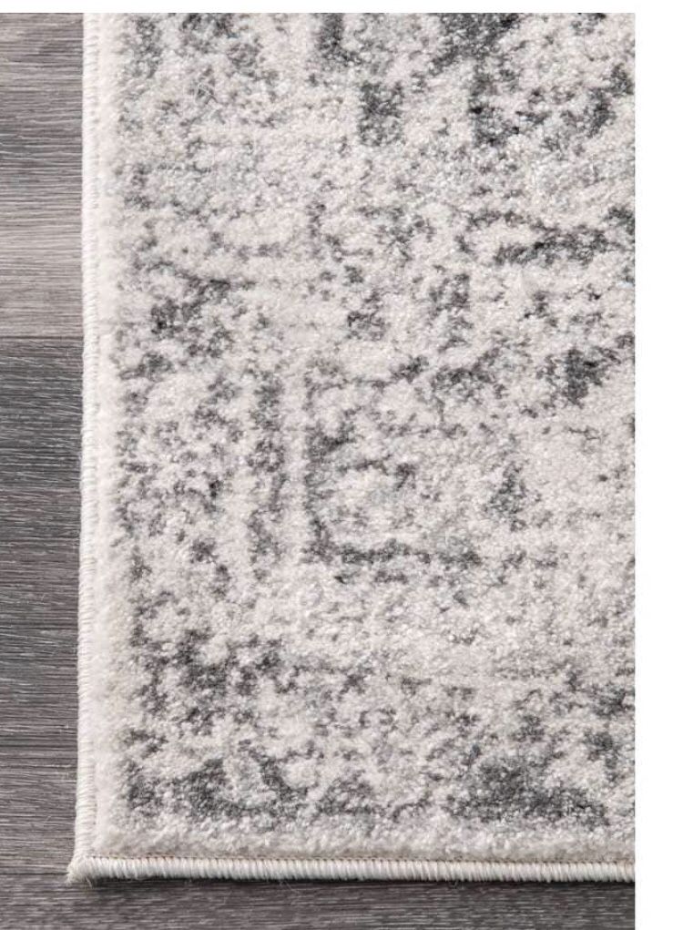 Area rug grey color 5’x 7.5’ rectangle