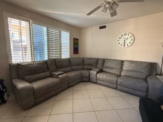 Gray leather reclining couch