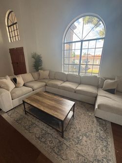 Sectional Sofa + Coffee Table + Pillows - $1,800
