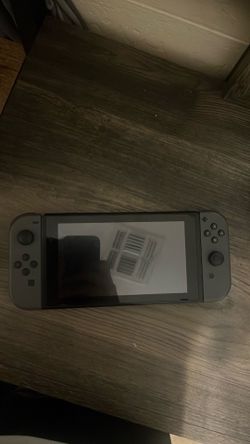 Nintendo switch  kit ( joycon charger, wired controller, right red controller , super smash bros)