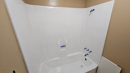 White Bathtub and Shower Surround Kit