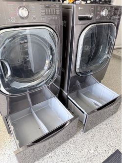 LG large capacity washer and dryer set with pedestal drawers