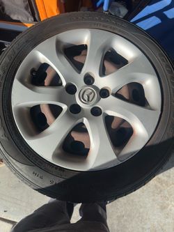 Original wheels for 2012 Mazda 3 and slightly used tires.
