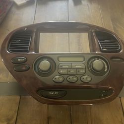 Toyota Sequoia Climate Control / Dash Trim Panel (Woodgrain) – Used