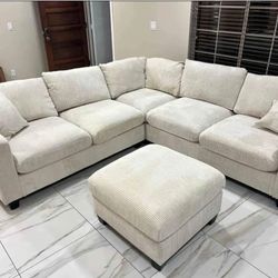 Beige corduroy sectional sofa with ottoman