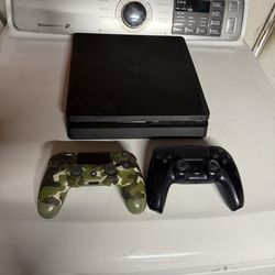 PS4 with 2 controllers and new power cable