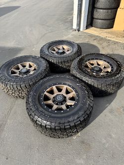 New 8x180 GMC Sierra Chevy Silverado 2500 18” Icon Wheels  35” Falken WildPeak AT Tires 18x9 +12 ET