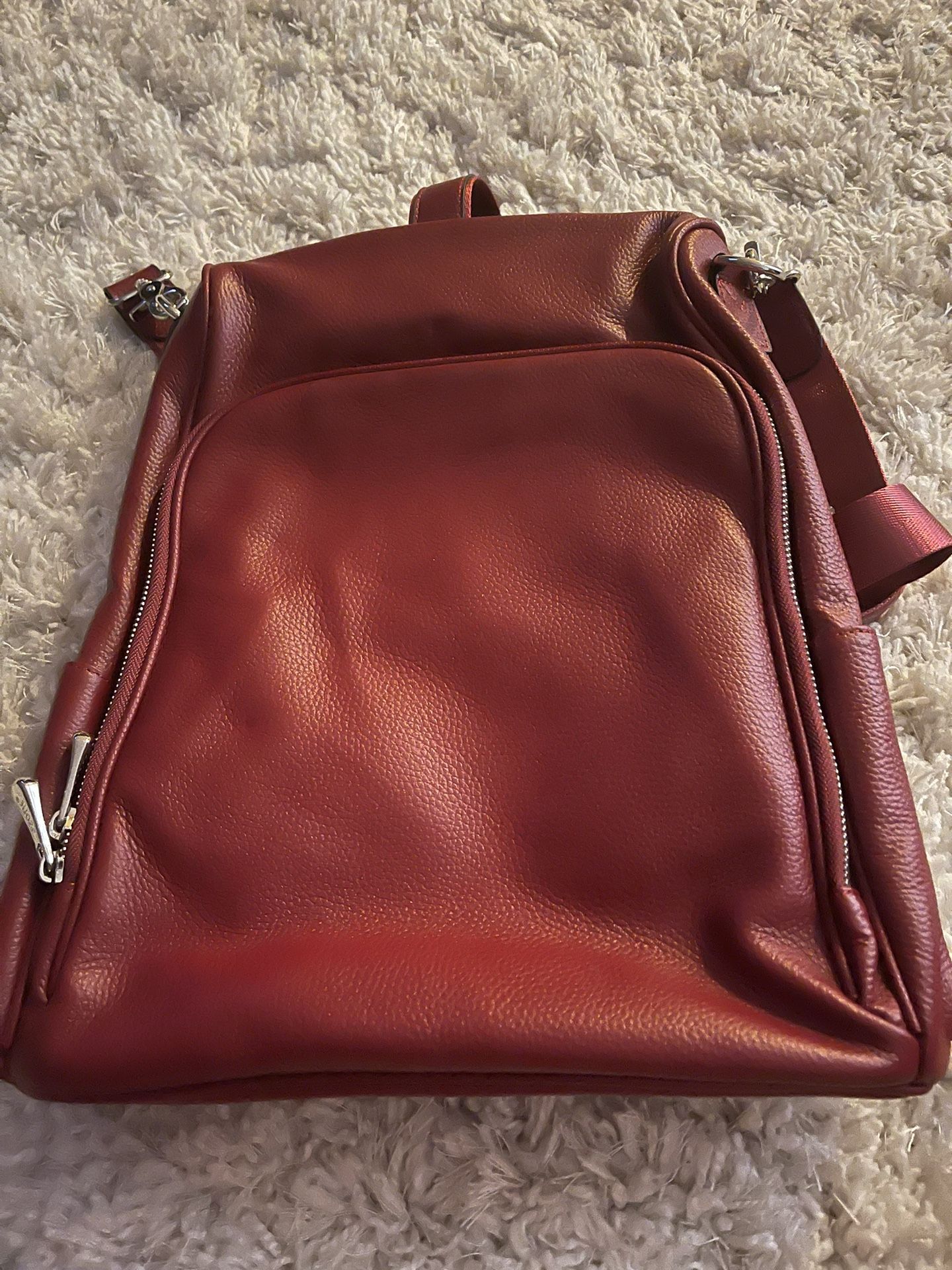 Red leather backpack