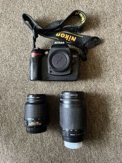 Nikon D70s, 18-55mm, 70-300mm, and backpack