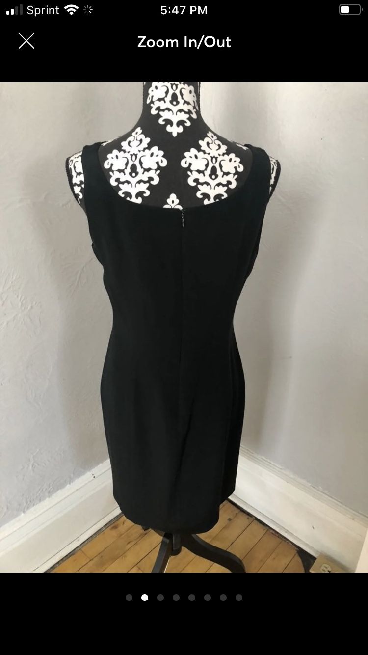 100% SILK Hugo Buscati little black dress loaded with Taylor designs including darts down the back and the front to enhance fitting, A hidden zipper