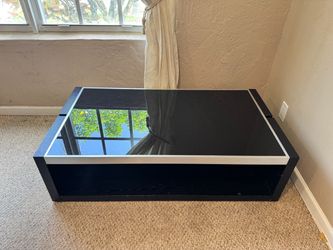 Modern Black Glass Coffee Table  Price: $100
