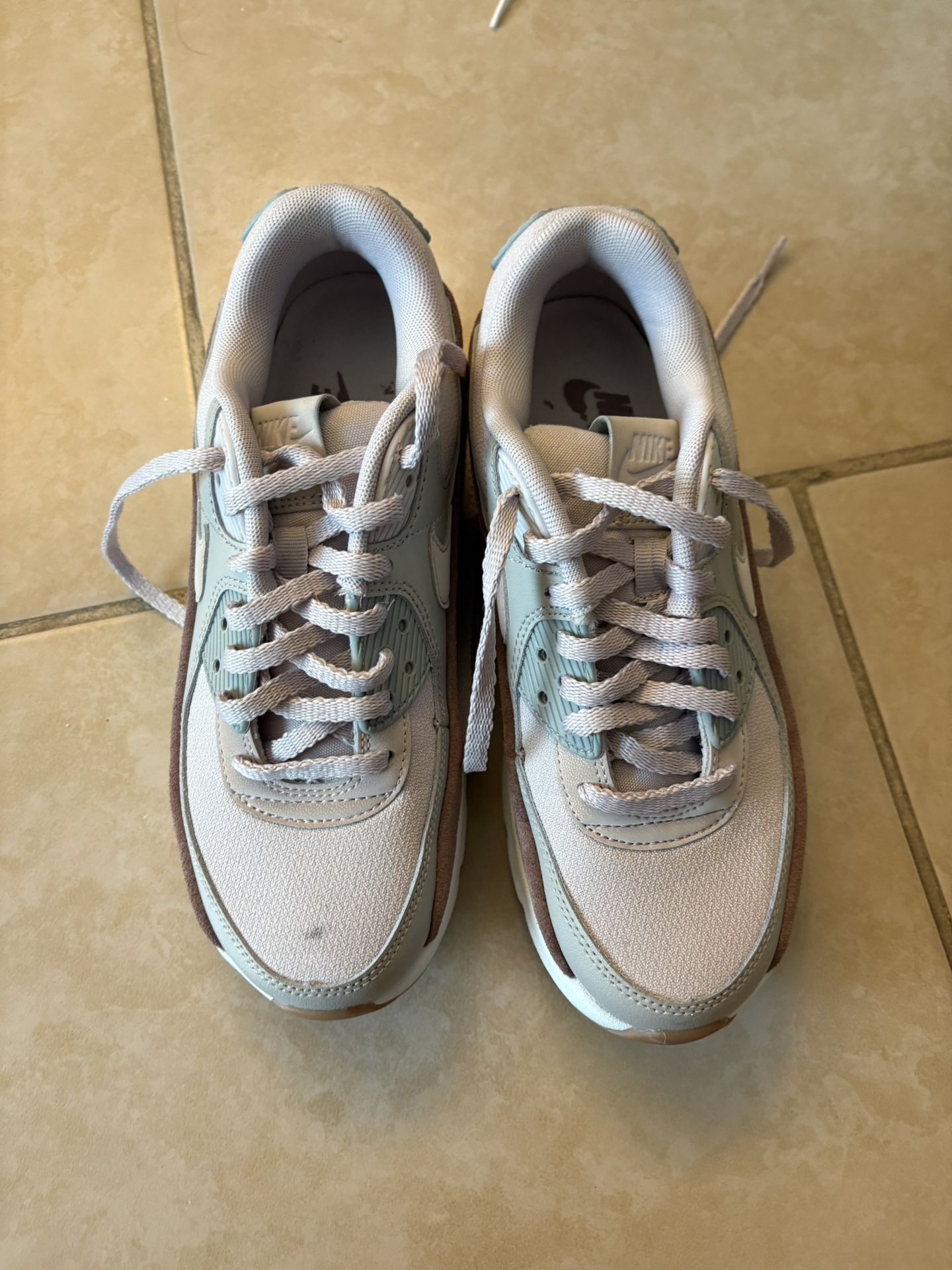 2 Pairs Of Nike Shoes