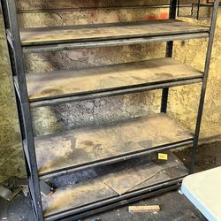 Free. 5 foot high shelf unit on wheels.  Needs cleaning