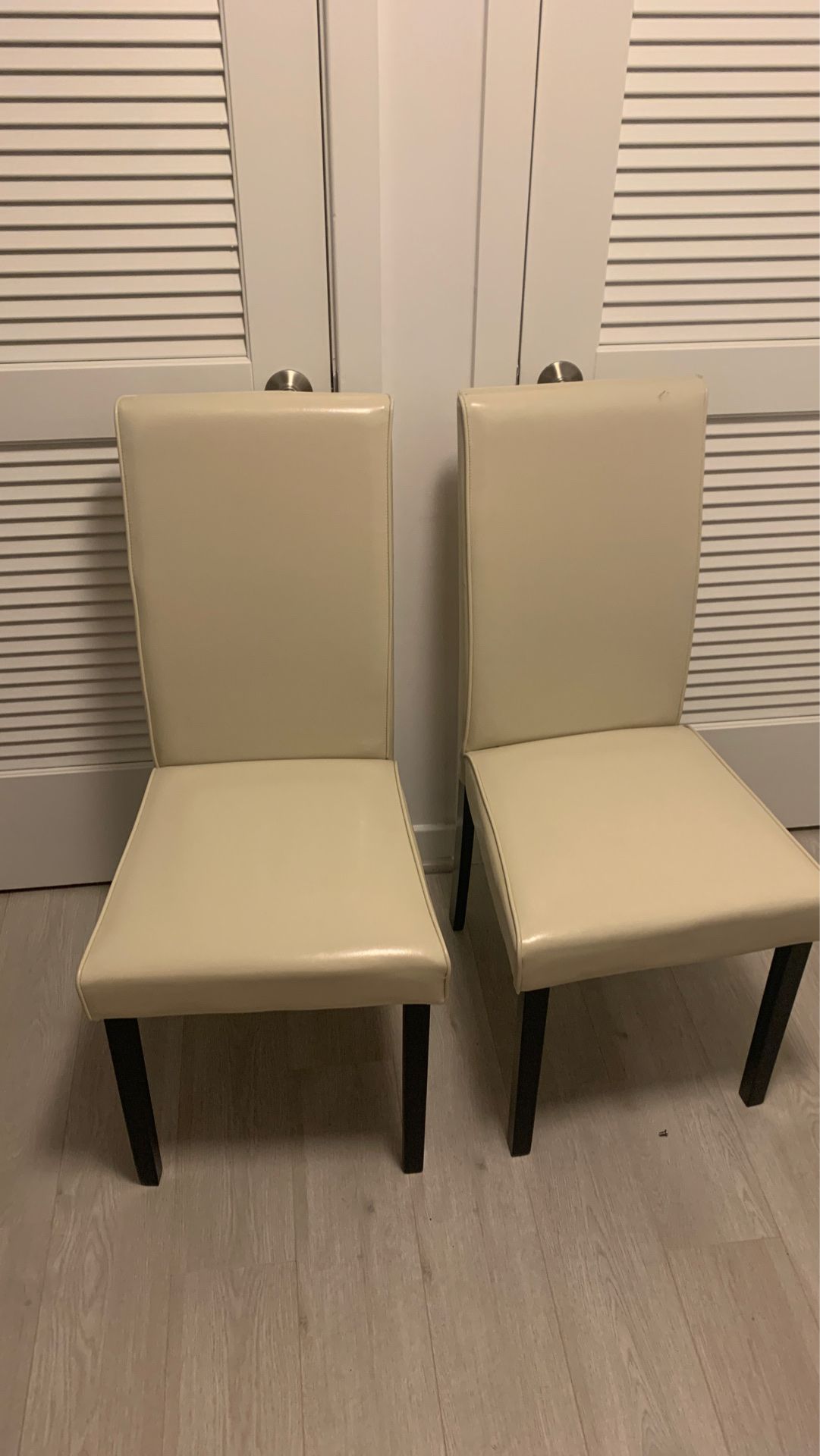 Ivory Faux Leather Chairs