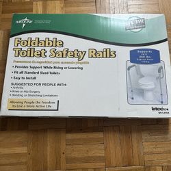 Brand New In A box  Foldable Toilet Safety Rails 