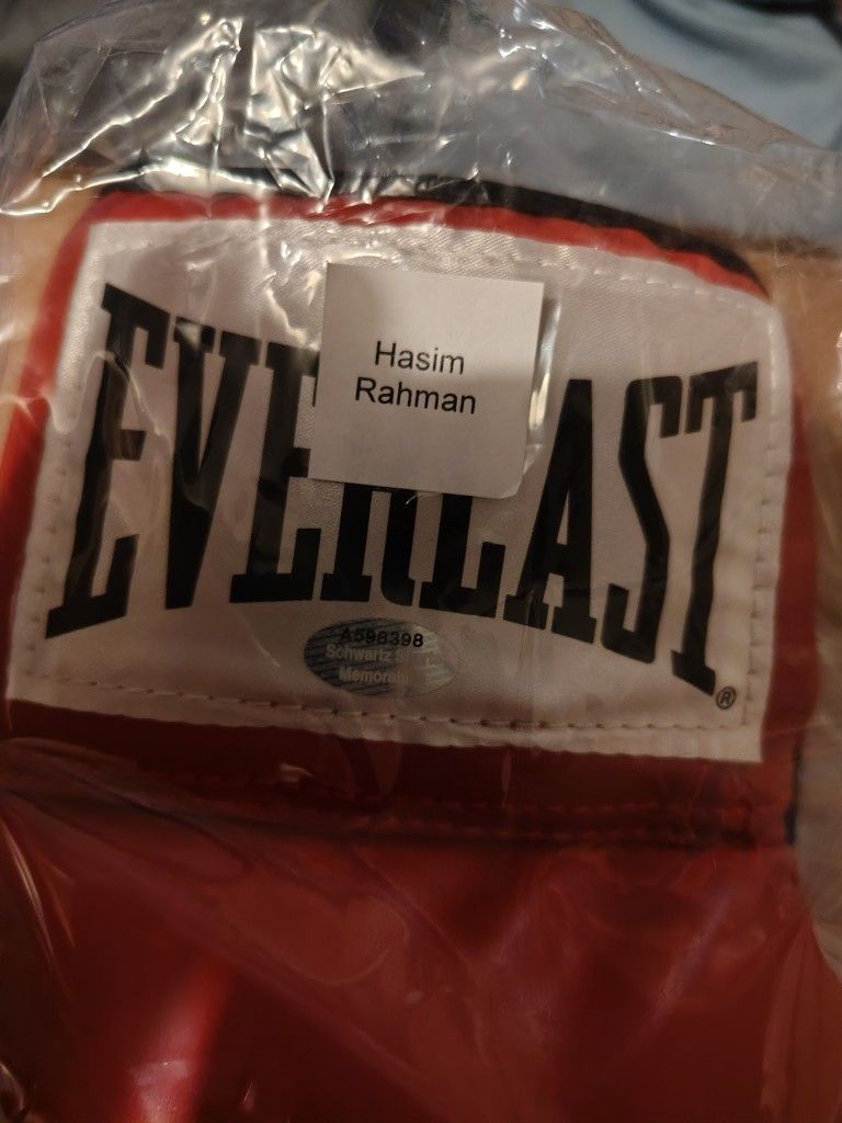 Autographed Boxing Glove By Hasim Rahman And Autographed Robert Shaw Football Jersey With Beckett COA And JSA