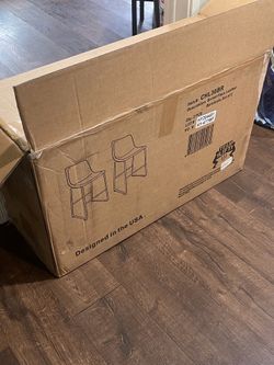 2 brown barstools