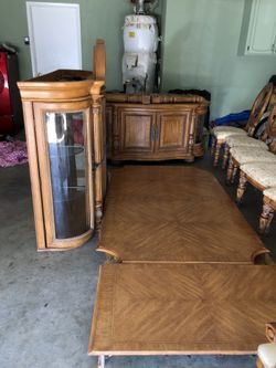 Extending dining room table with side cabinet