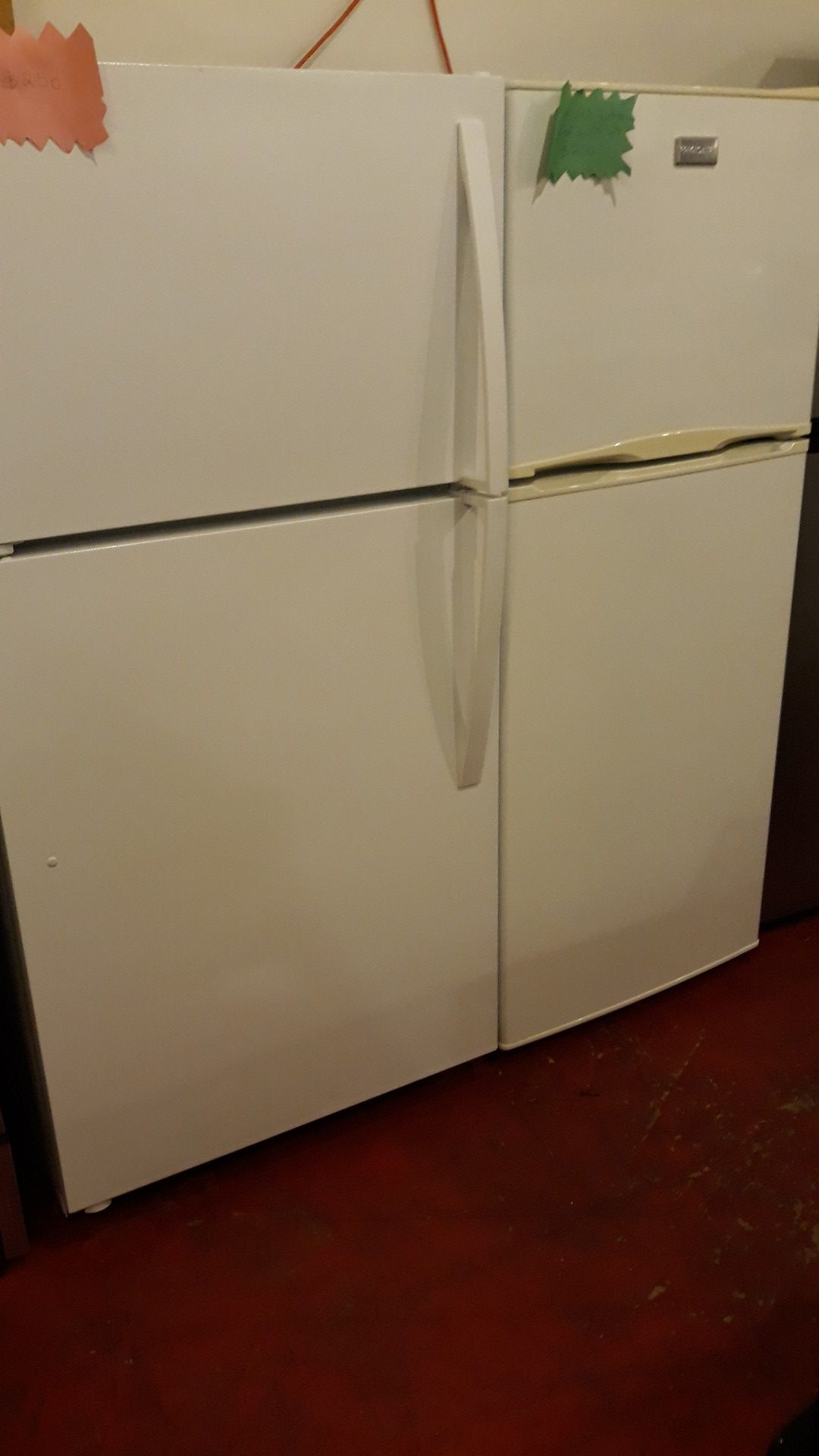 Top and bottom refrigerator excellent condition 4months warranty 24"