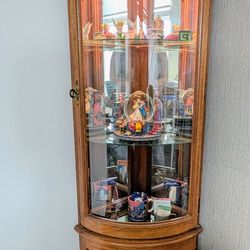 Vintage Bow-Front Oak Curio Cabinet – Lighted with Mirrored Back