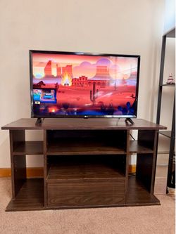 LG 32 inch smart TV with stand and Roku system