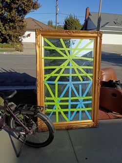 Antique glass mirror with an antique frame