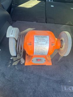Powerful orange Central Machinery bench grinder