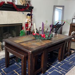 Brown wood table with chairs 