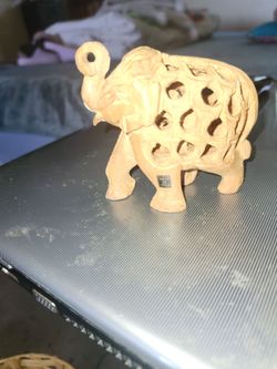 Hand carved elephant with baby