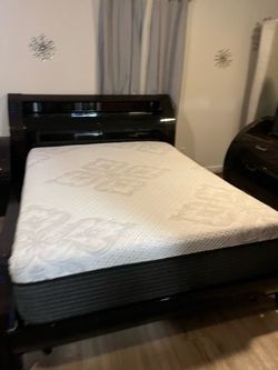 Queen size bed and mattress and  dressing table and nightstand
