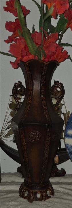 Large vintage‑style embossed metal vase with double scroll handles. Height 13", diameter 8". Nice rustic brown finish, good condition. Decorative home