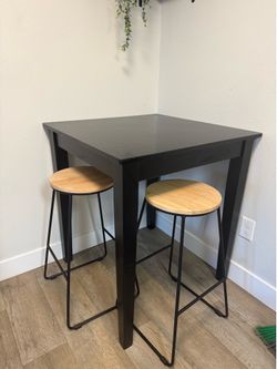 Dining table and two chairs