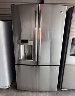 GE Stainless Steel Refrigerator And Freezer