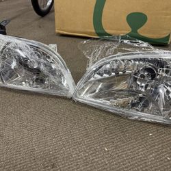 For Toyota Sienna 2001 2002 2003 Headlight Driver and Passenger Side | Pair | Composite | TO, TO | 811, 8111008020 