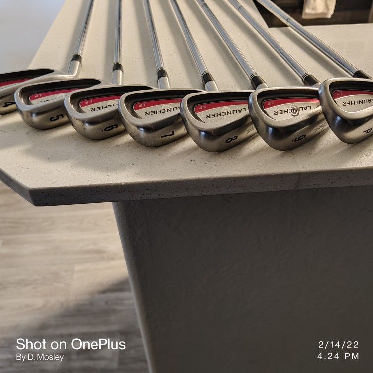 LH Cleveland Launcher LP Irons 4-PW Great Condition NEW grips Stiff Shaft.