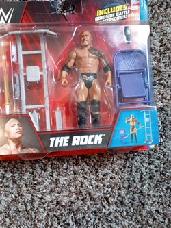 The Rock sealed action figure set by Mattel