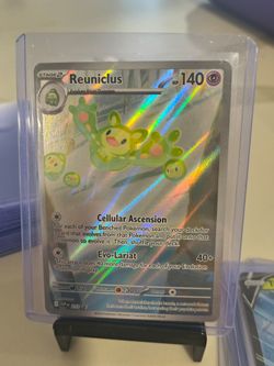 Reuniclus SVP 212 illustration Rare Holo Pokémon Card