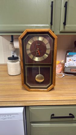 Devon Quartz Wall Clock With Pendulum.