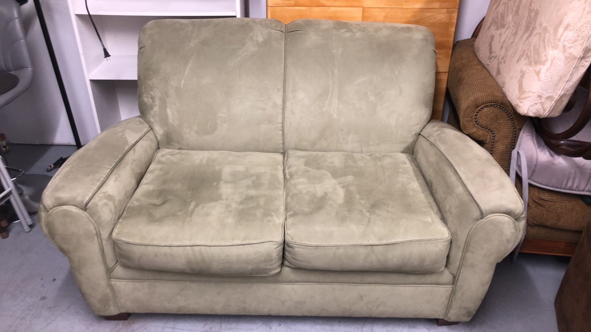 Light green beautiful loveseat easy to clean