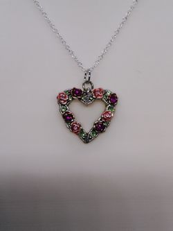 Pink And Purple Roses In Silvertone Heart