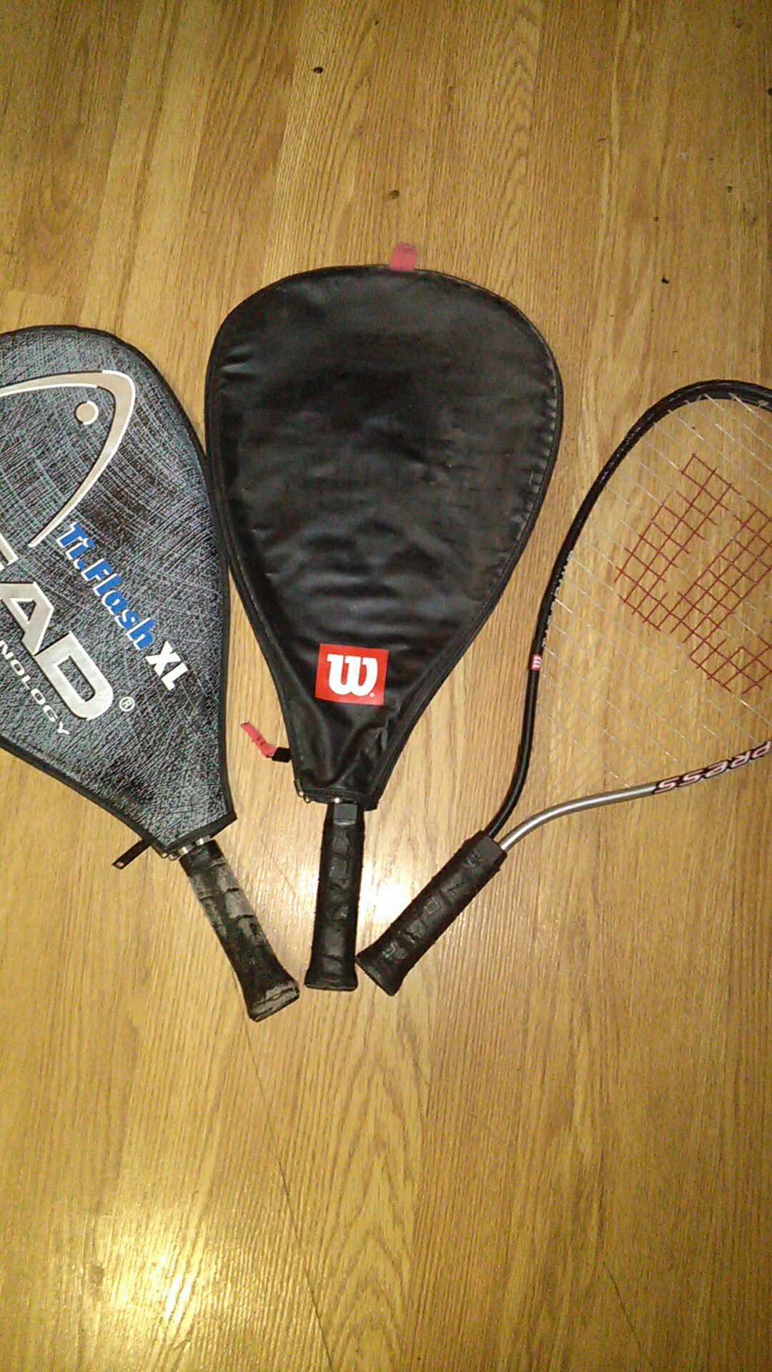 Tennis rackets with cases