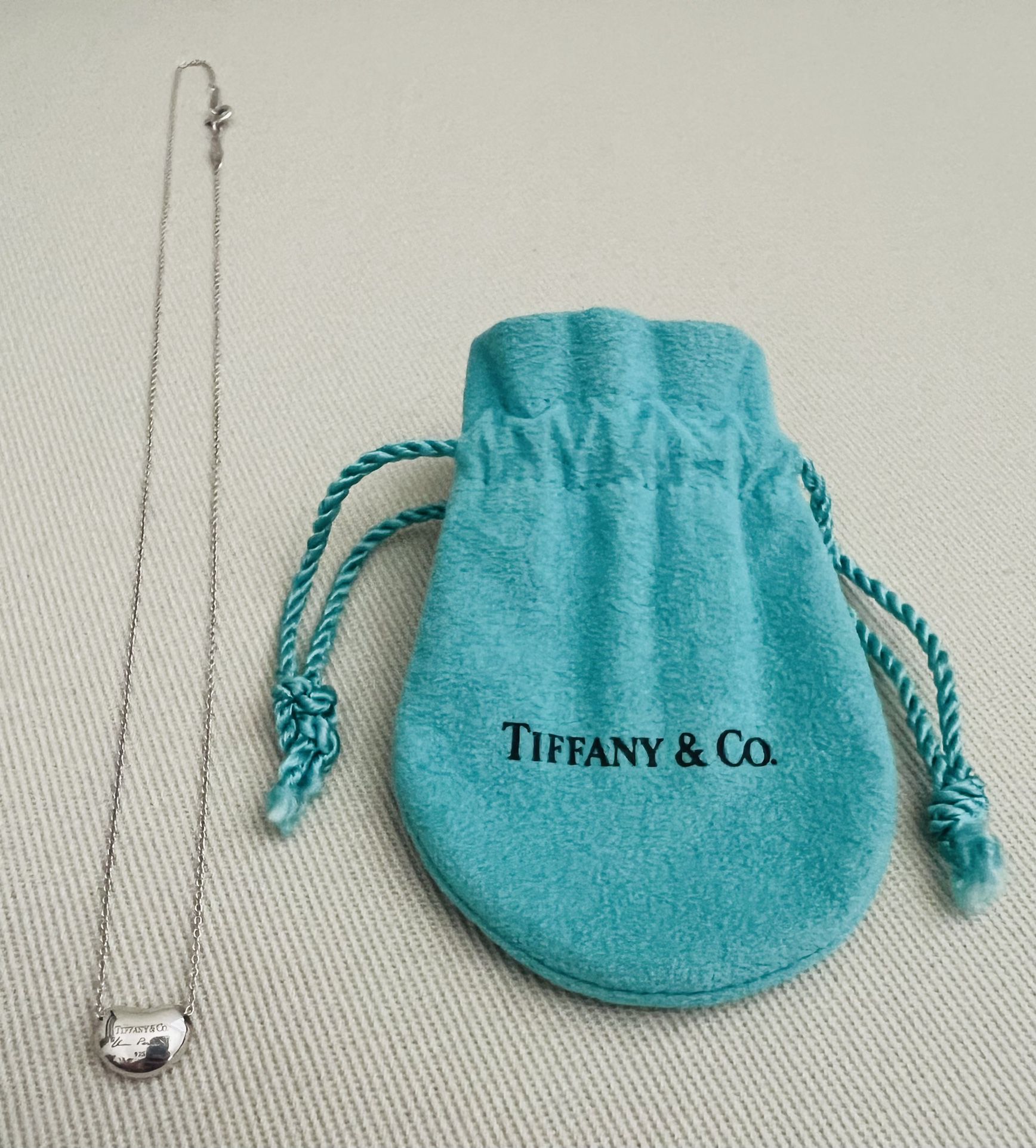 Tiffany & Co. Bean Pendant Necklace w/ Chain & Bag for $175