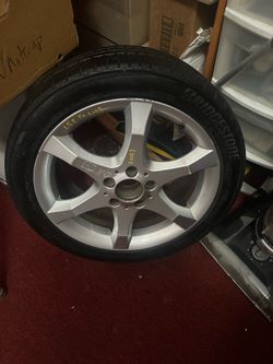 Brand New Bridgestone Tire with Rim