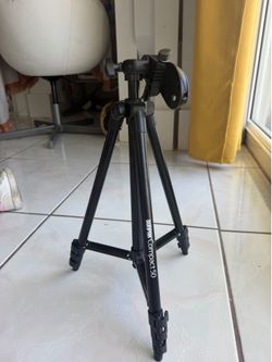 Black Tripod camera