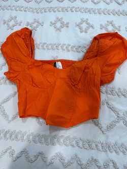 Orange women’s top