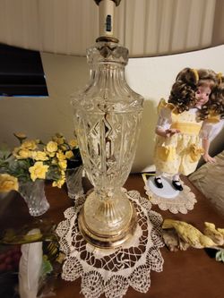 Crystal lamps, perfect, beautiful, heavy new lampshades, that work great. The set is one eighty